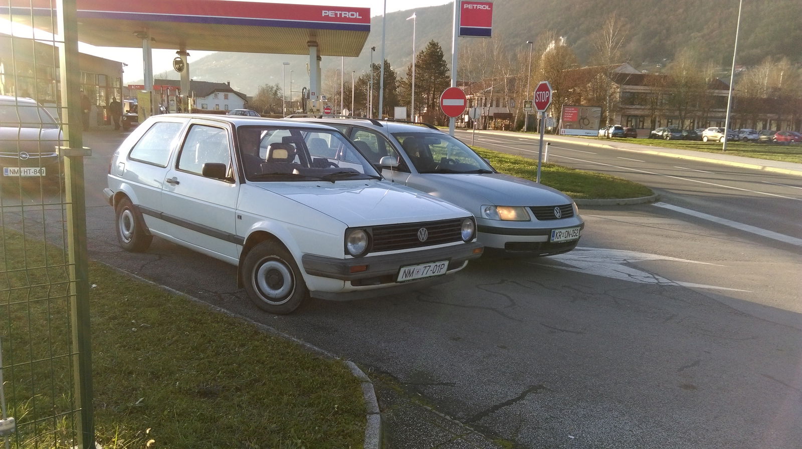 My Golf on the day I bought it, next to my friends VW Passat