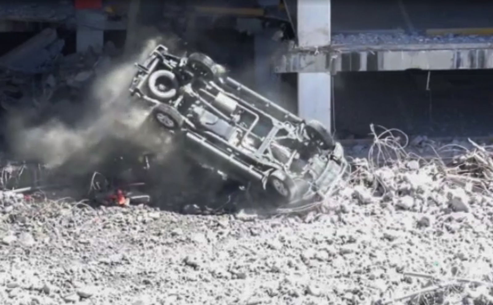 Watch A Demolition Arm Pluck A Navara From A Quake-Hit Multi-Storey Like A Toy