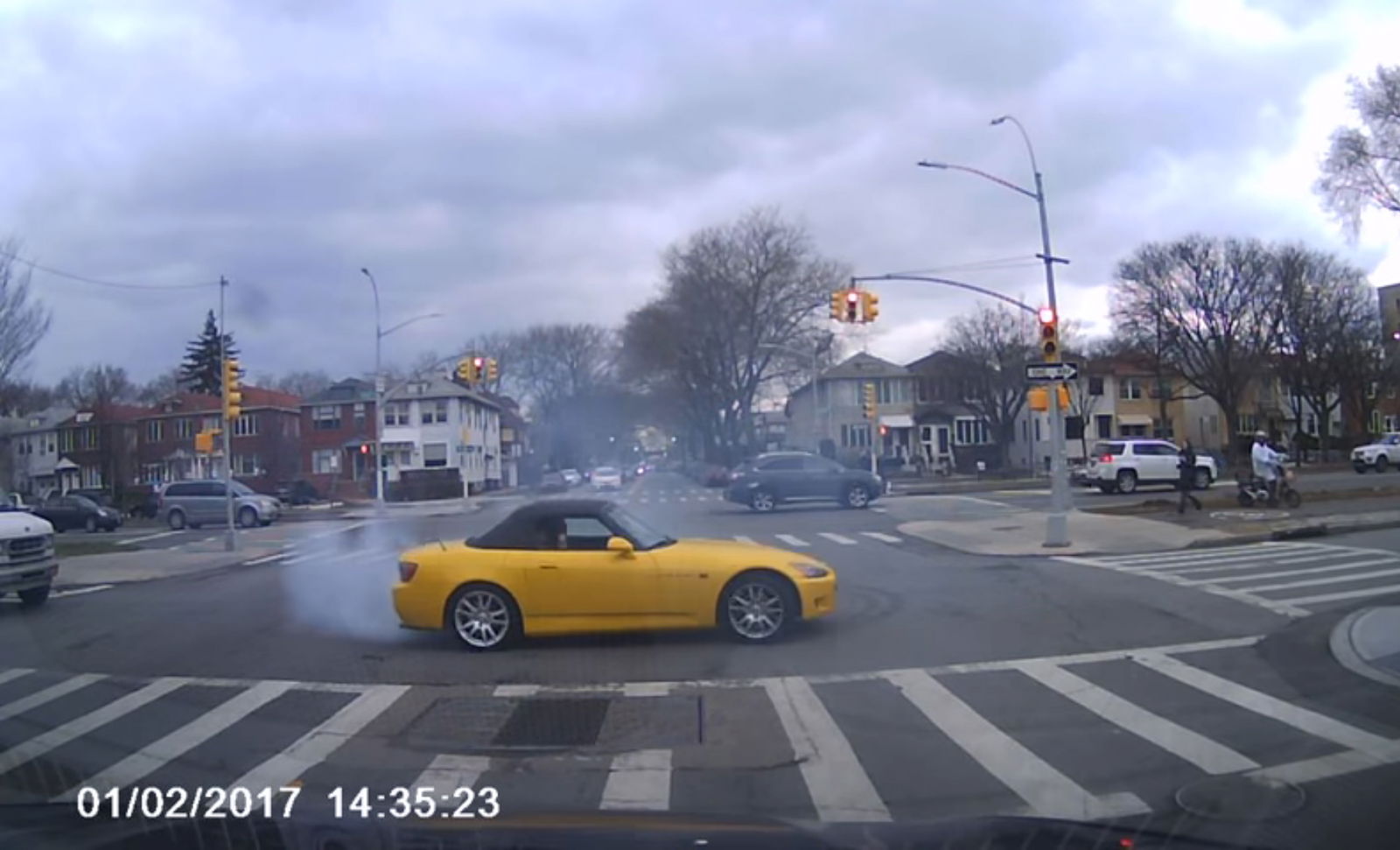 This S2000 Driver Gives No Damns For The Law As He Pulls Donuts At A Busy Intersection