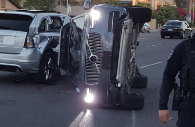 This Self Driving Uber Vehicle Is On Its Side After A Collision In Arizona.