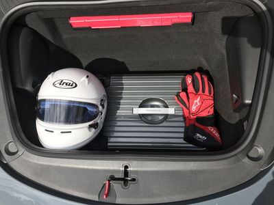 718's frunk is big enough for all the stuff you need - a helmet, a pair of gloves (which I never used tbh) and a suitcase for other necessities. There's also a decent size rear boot for your passenger's kit as well as a storage area over the engine bay for some coats.