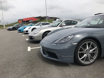 A combination of cars. You can either borrow one of their cars, or you can use your own car. Of course I decided to drive my own car (totally not because I can't afford to rent their GT3 RS...)