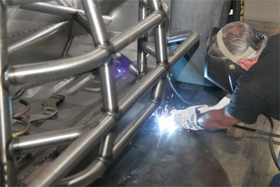 Here we see a common middle aged white male Mig welding a roll cage for a mental race car. Whisper, we dont want to startle him.