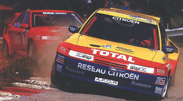Pailler driving the updated car, Stievenart in the background is back in the older car.