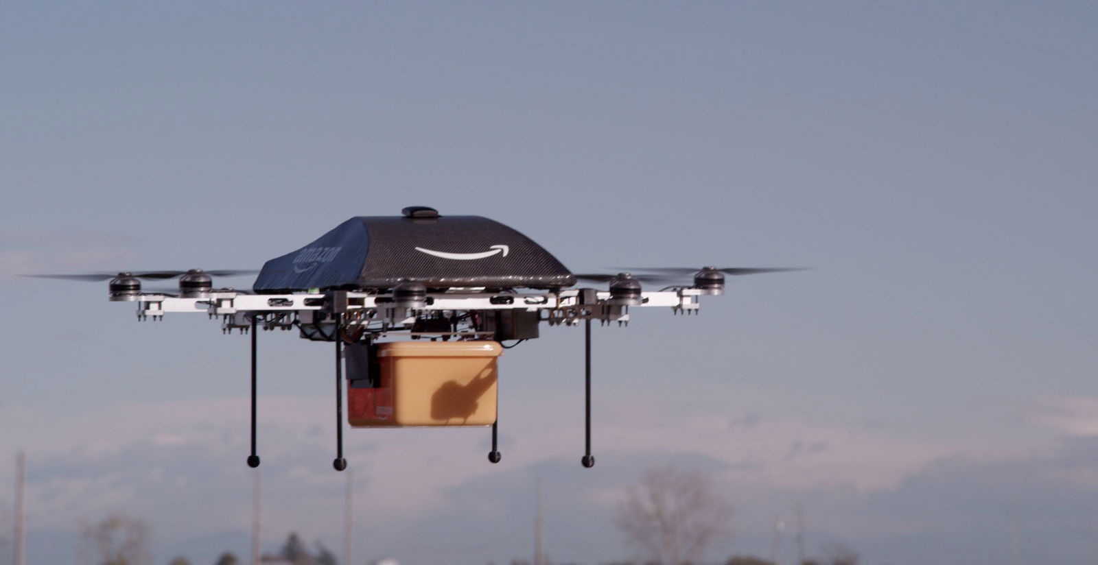 Soon Amazon Drones Will Be Able To Recharge Your Electric Car… While You’re Driving