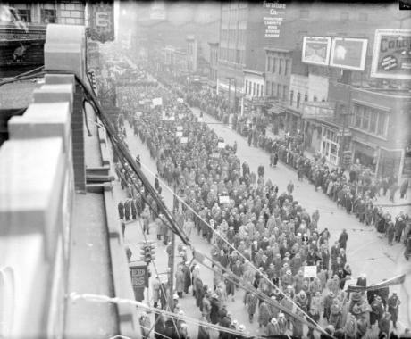 Workers marching on the streets of Detroit
