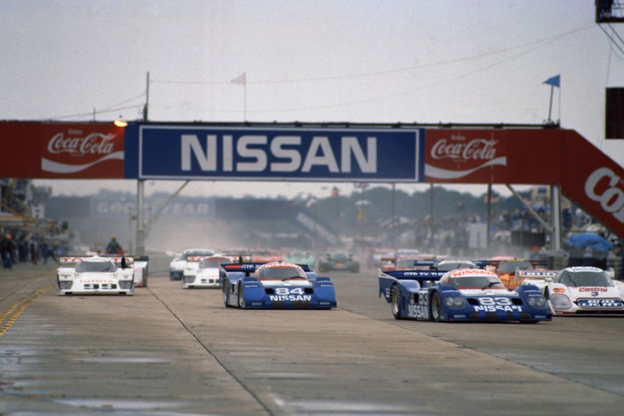 The GTP field rushes of into Turn 1 of the 1991 12 Hours of Sebring.