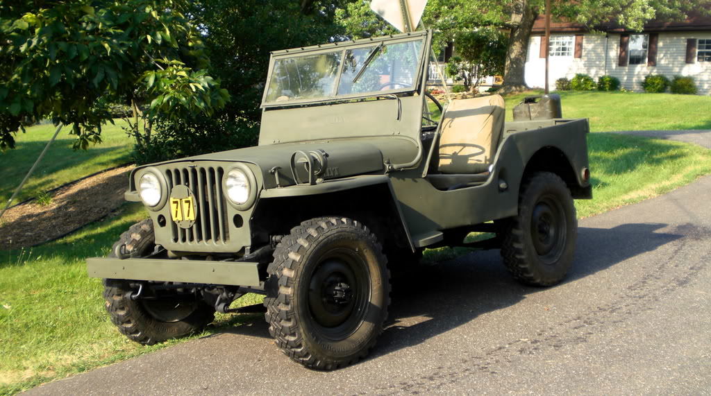 A Willys CJ-2A in olive drab.