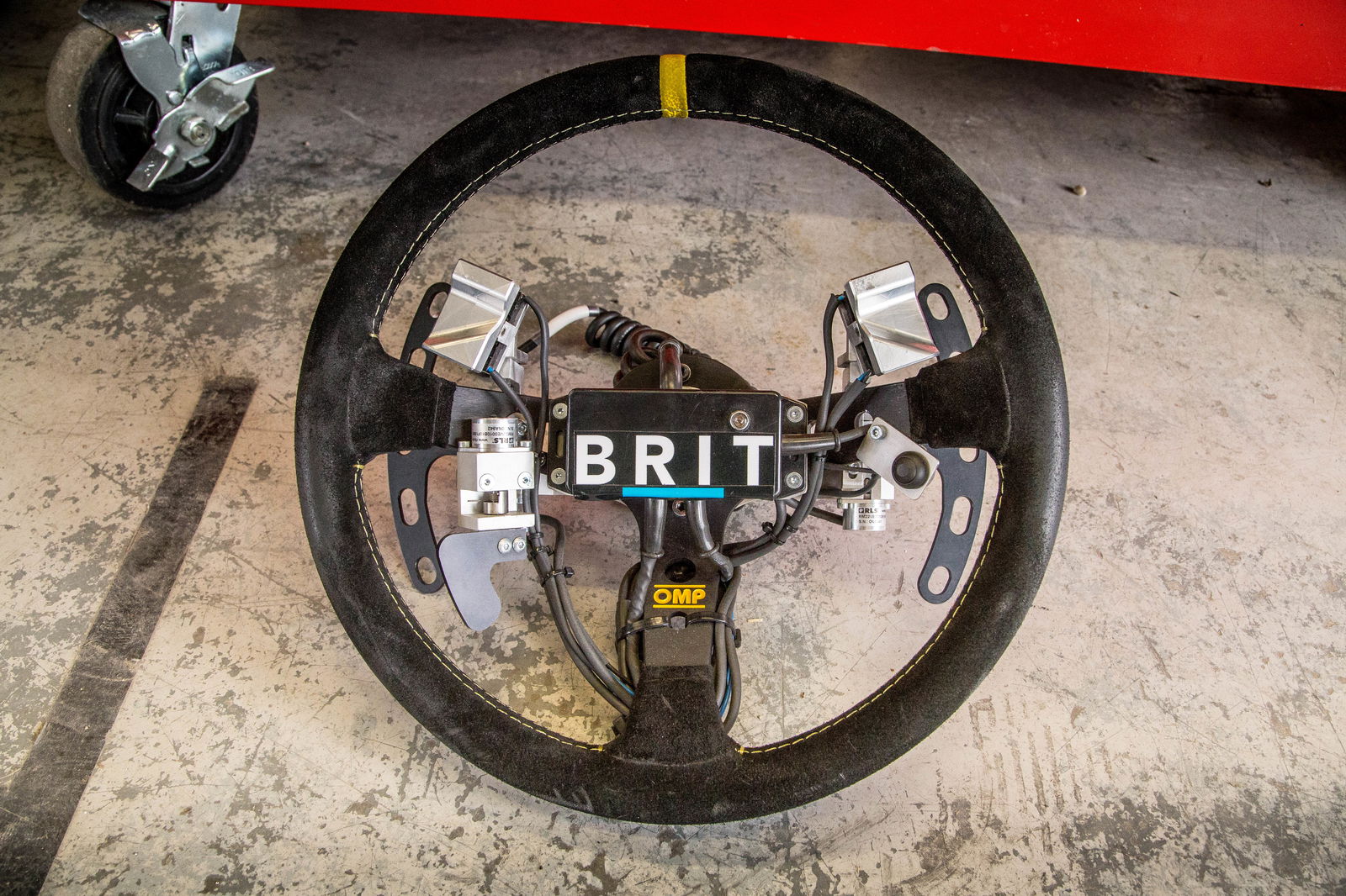 The paddles at the rear operate the throttle and brake, while each of the silver buttons can take care of both upshifts and downshifts