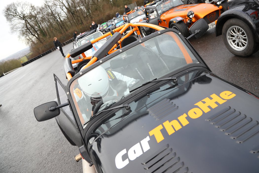 Four-point harnesses are a pain, especially when you're wearing a helmet and Hans device... (Photo: Snappy Racers)