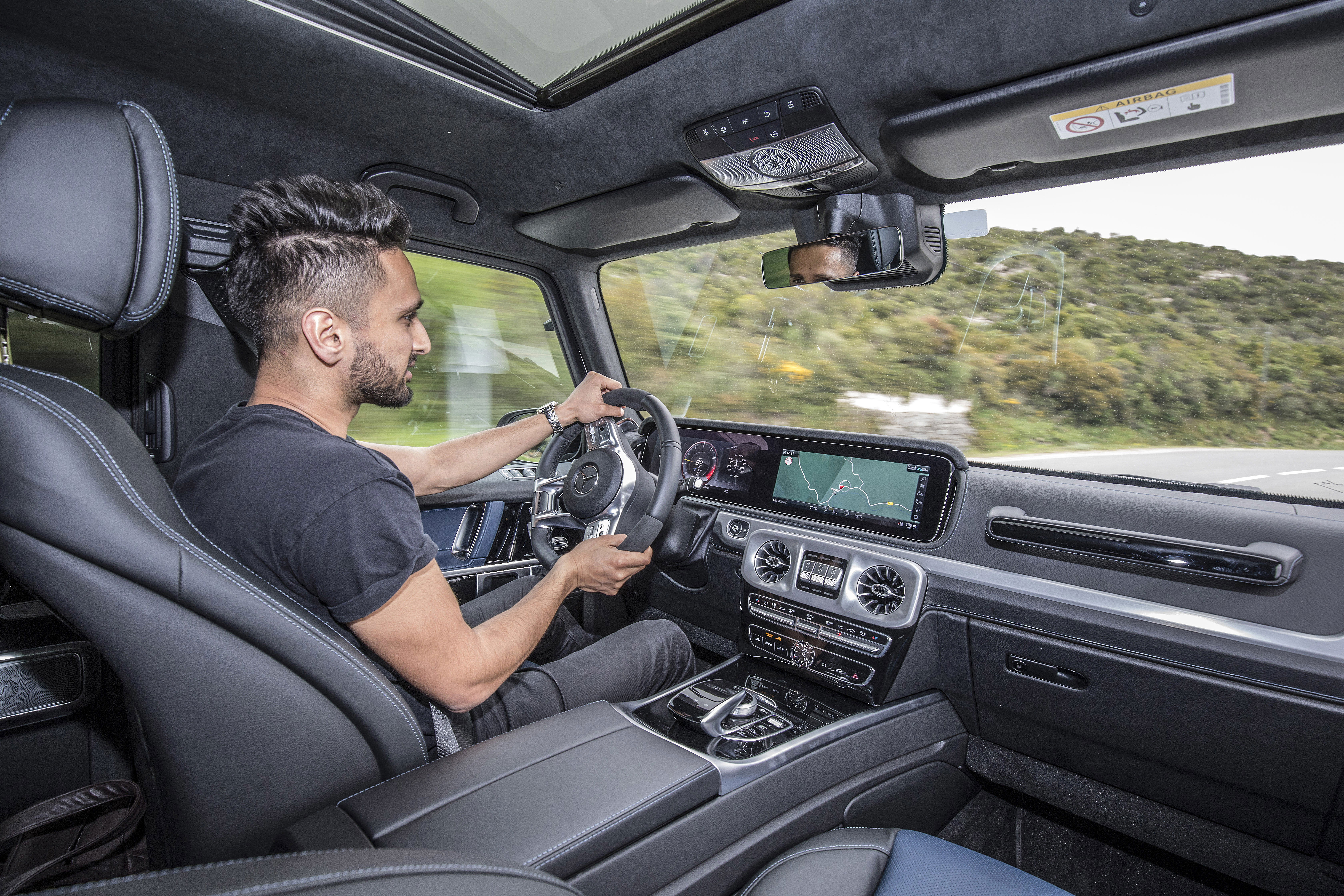 Your author looking bemused at the new G63's ability to actually travel in a straight line