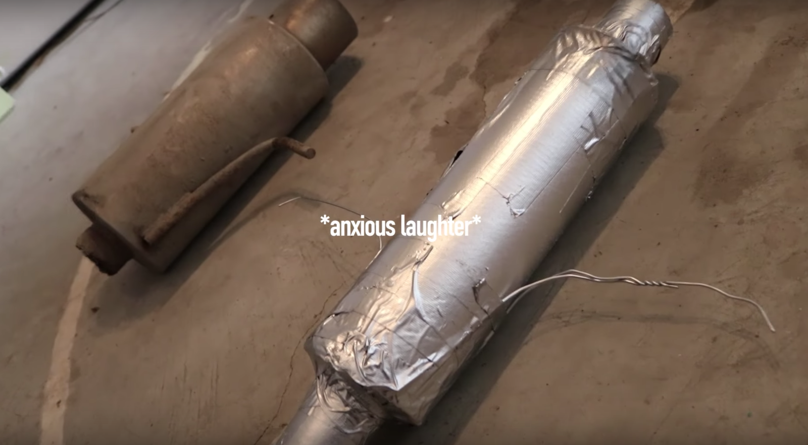 Watch This Guy Hilariously Attempt To Build A Cardboard Muffler