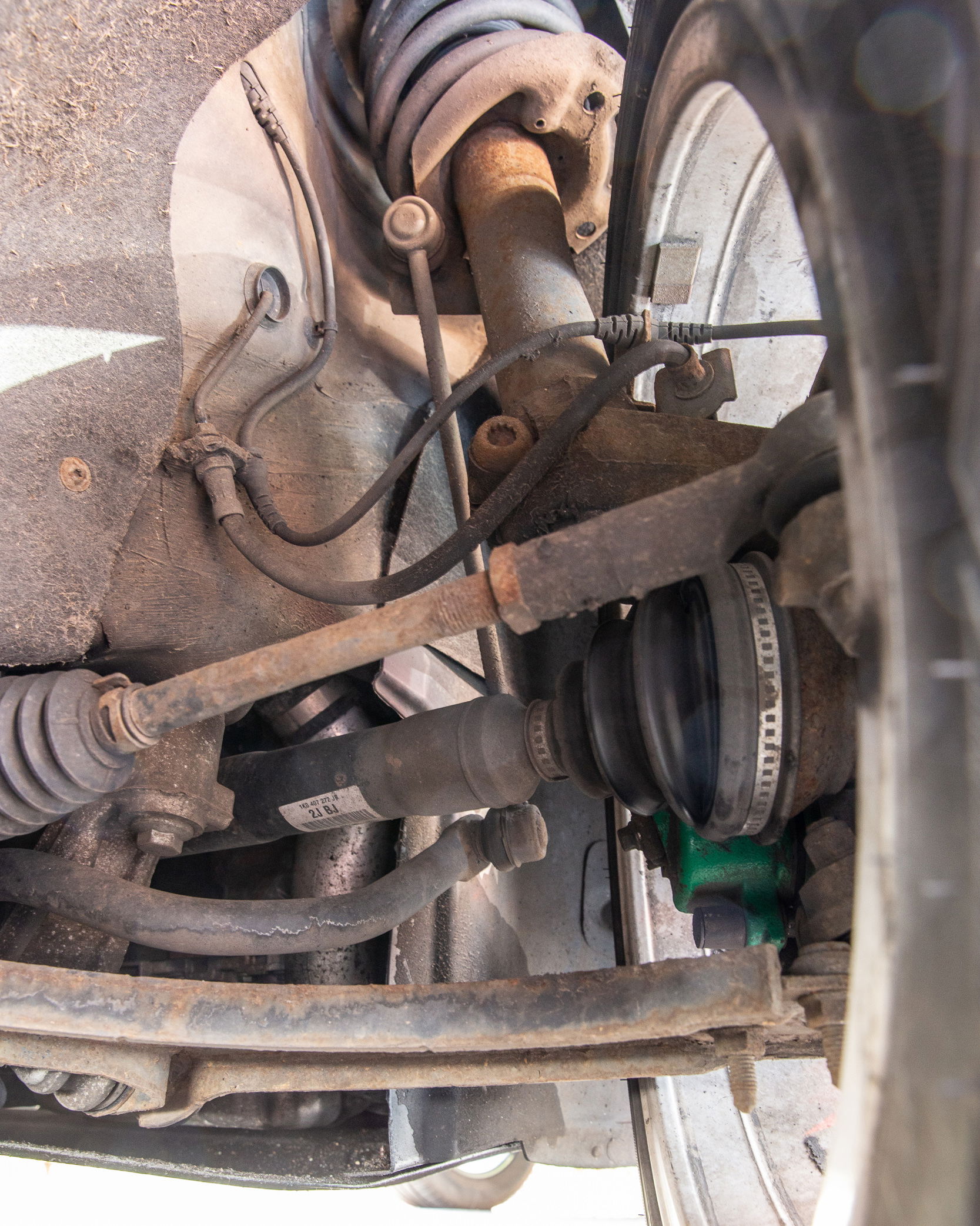 Suspension, top, control arm, bottom, drive shaft and steering arm