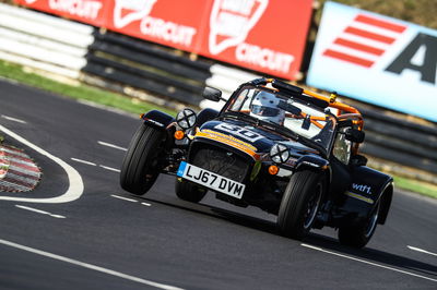 Four-wheel drifting and cocking a wheel. I'll never look this cool in a car again... (Image via Snappyracers.com)