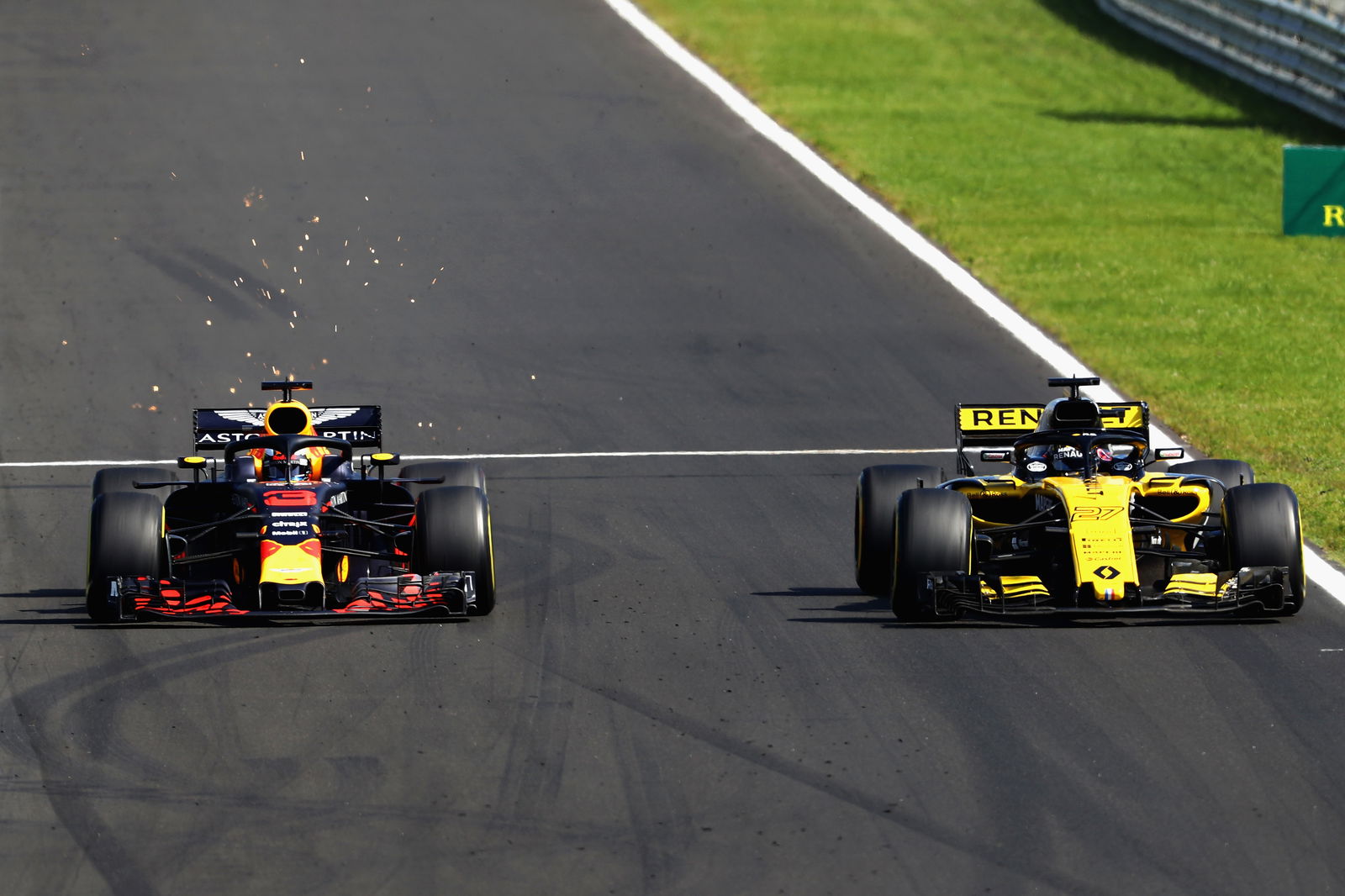 Daniel Ricciardo's Red Bull overtaking a slower Renault