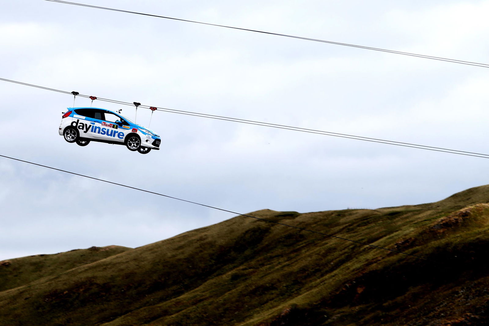 A Rally Car On A Zip Wire Is Today's Gold-Standard Jaw-Dropping Stunt