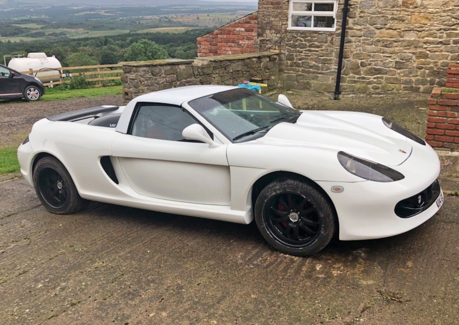 Bathe In The Horror Of This Replica Porsche Carrera GT
