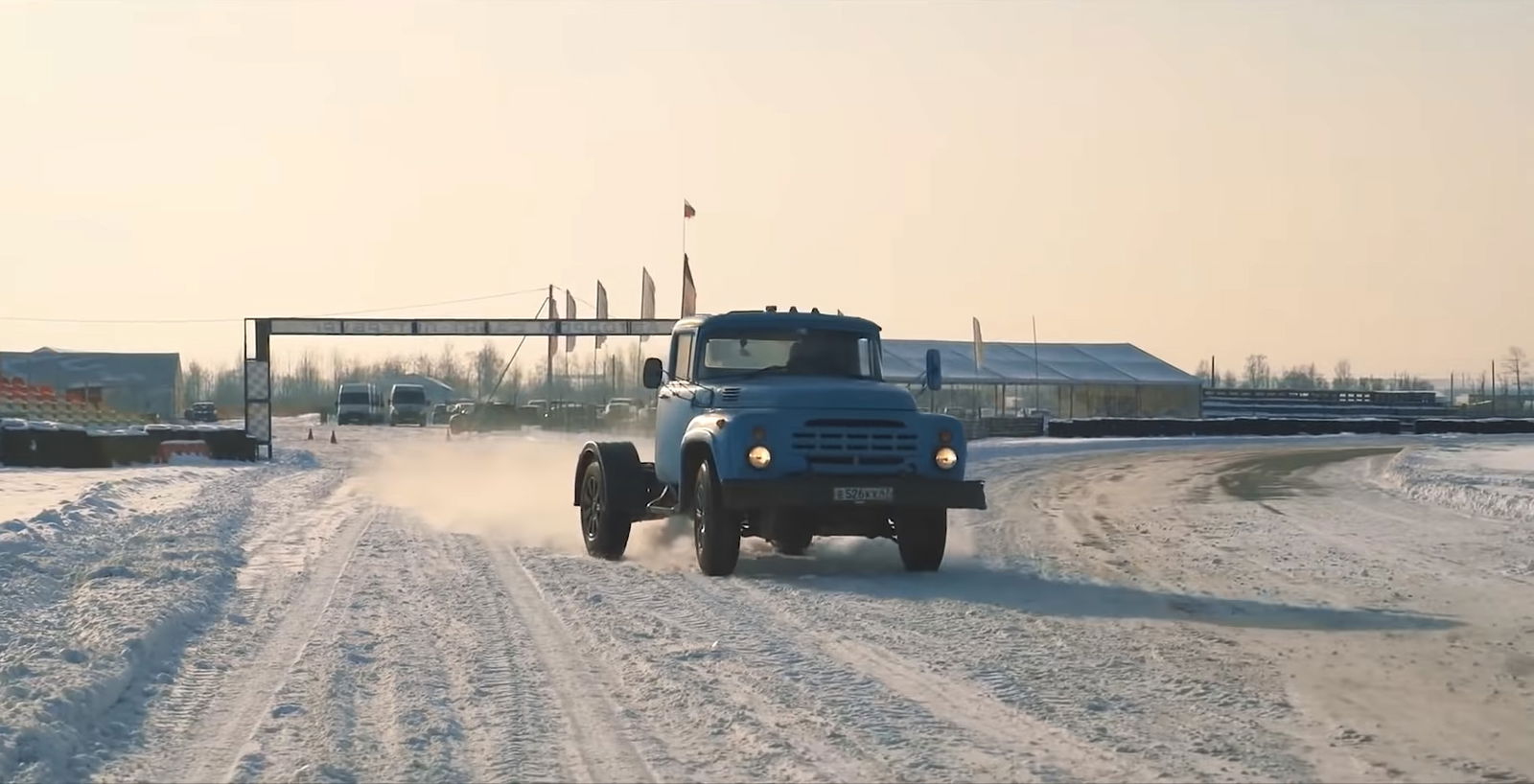 Watch An Old Soviet Truck Out-Drag A Porsche Cayman
