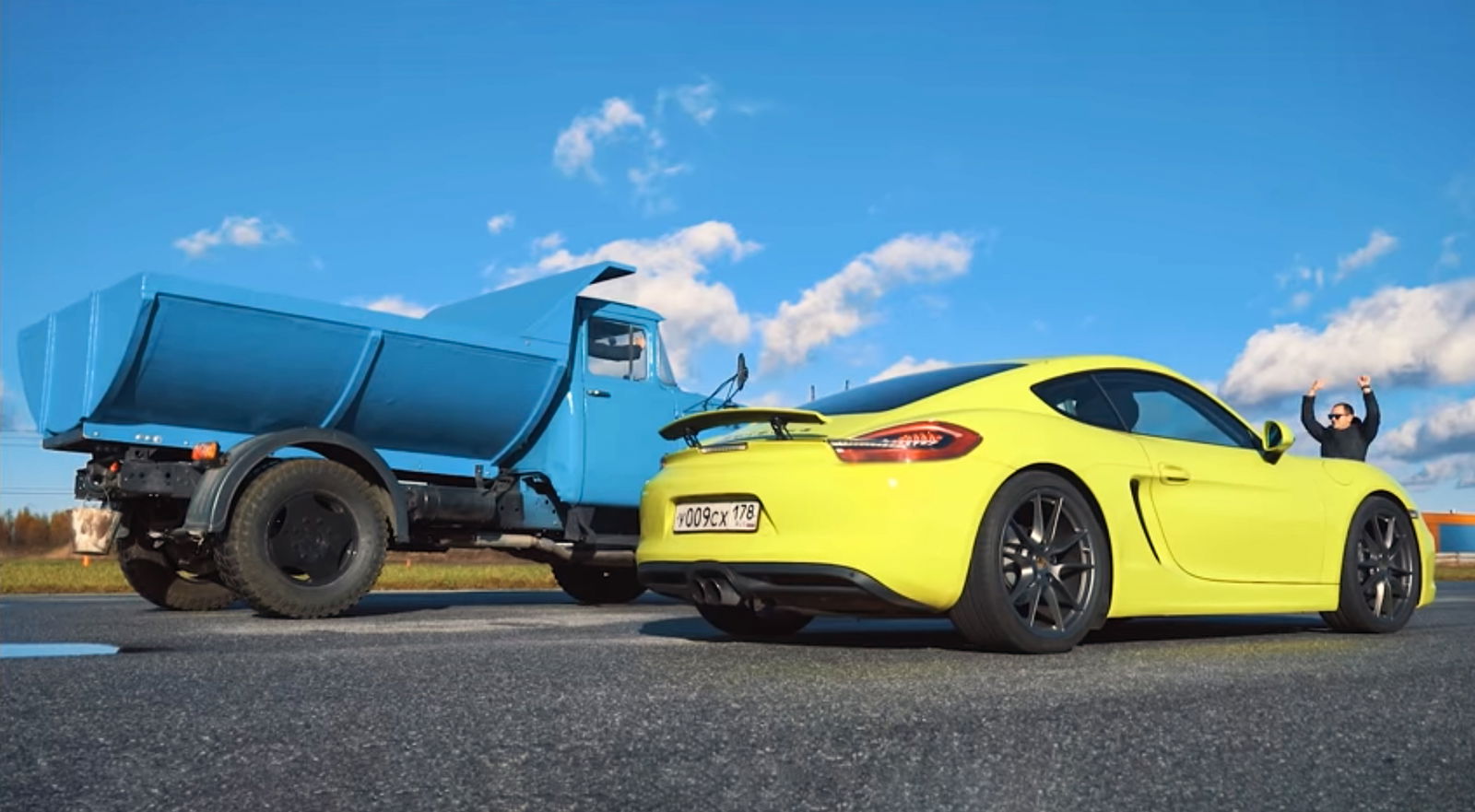 Watch An Old Soviet Truck Out-Drag A Porsche Cayman