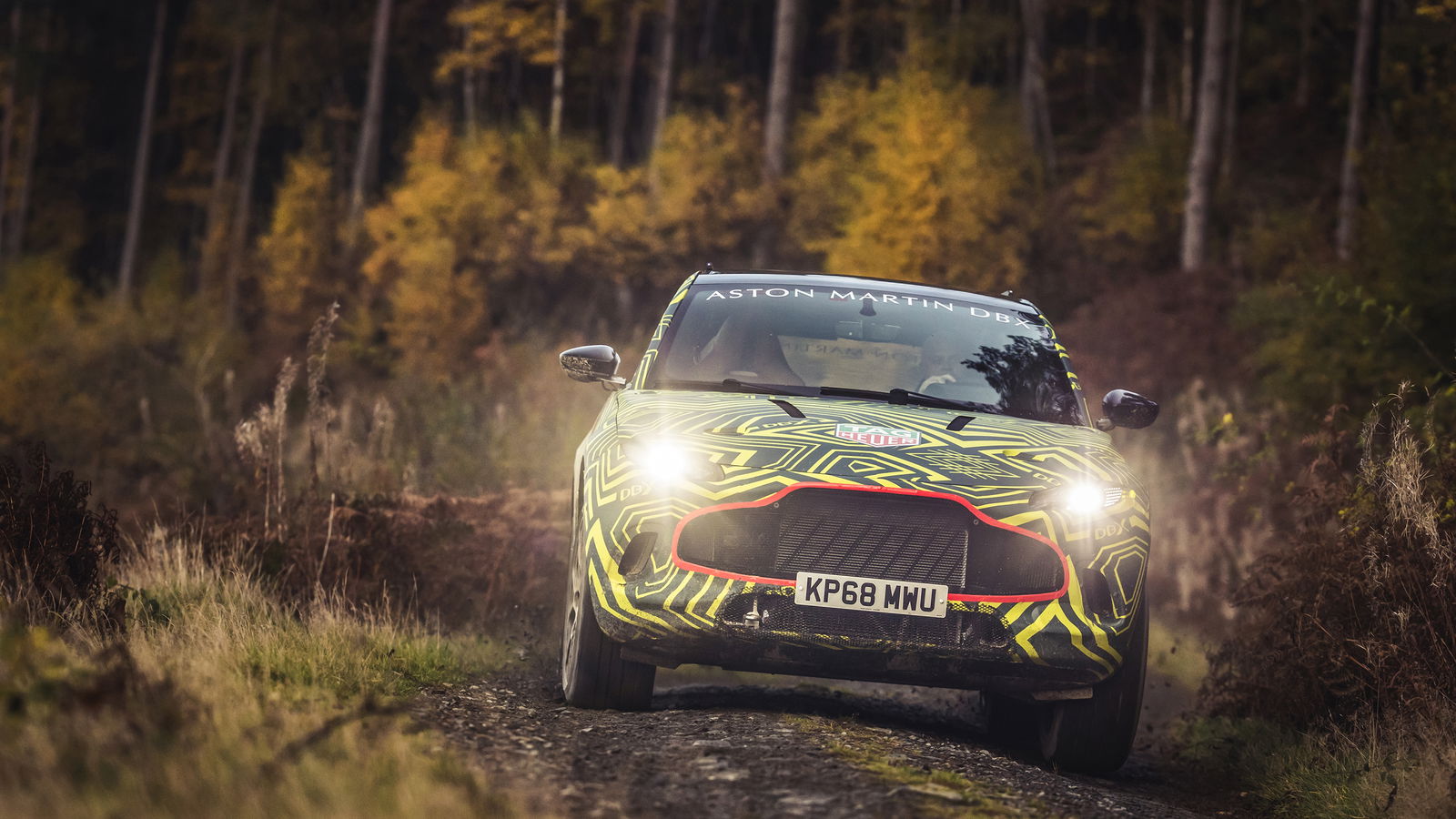 Here's Aston Martin’s New DBX SUV Testing On A Filthy Rally Stage