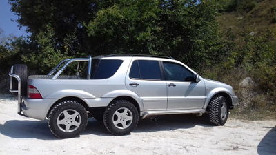 Someone's Built A Mad Six-Wheeled Mercedes ML-Class