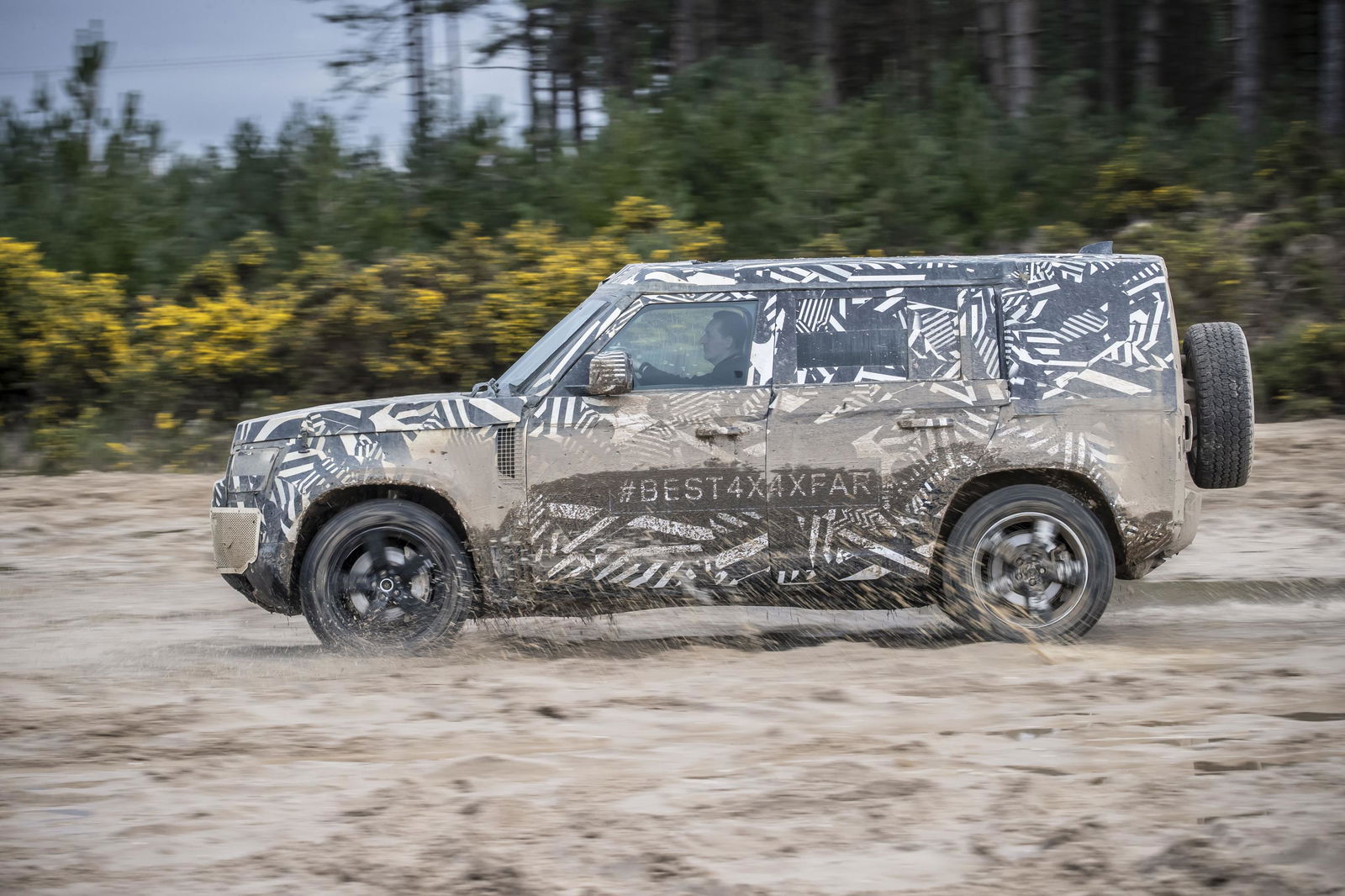 Here's The New Land Rover Defender Doing Land Rover Defender Things