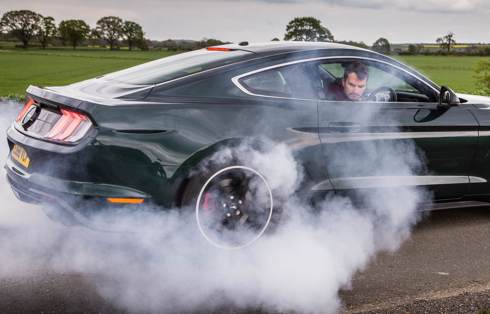 The car used in the film had a smoke machine in the boot, but the modern Bullitt Mustang doesn't need one...