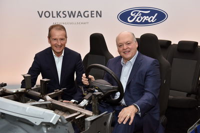 VW CEO Dr Herbert Diess (left) pictured with Ford CEO and president Jim Hackett