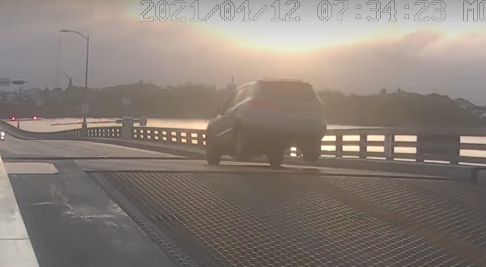 CCTV Footage Shows Driver Jumping Rising Drawbridge