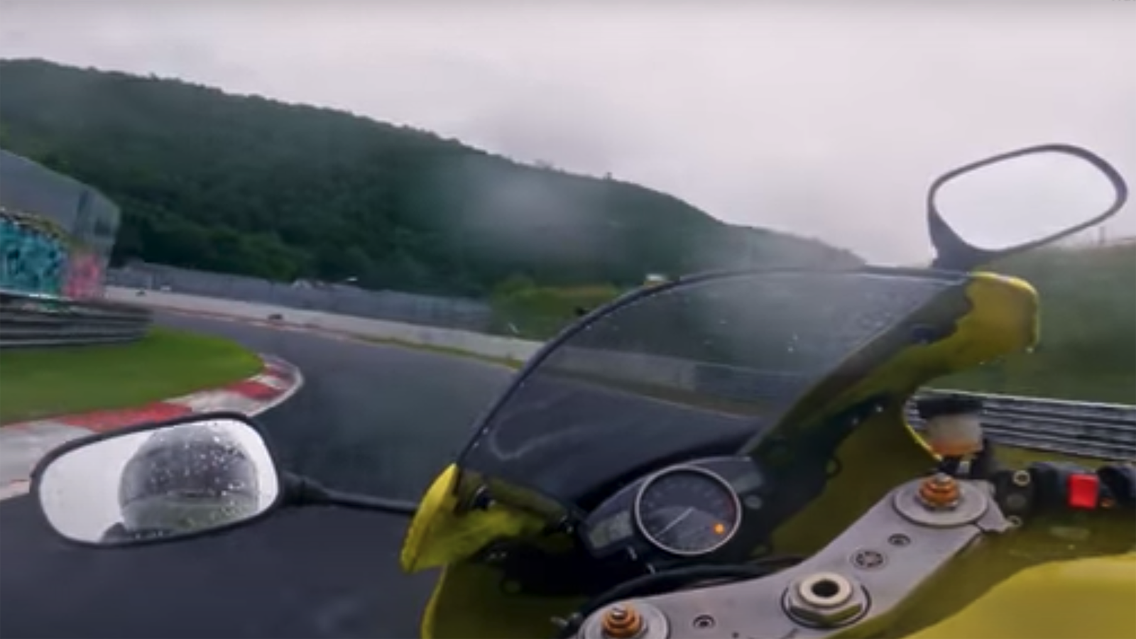 Riding The Nurburgring In Torrential Rain Is Nervy And Fascinating To Watch