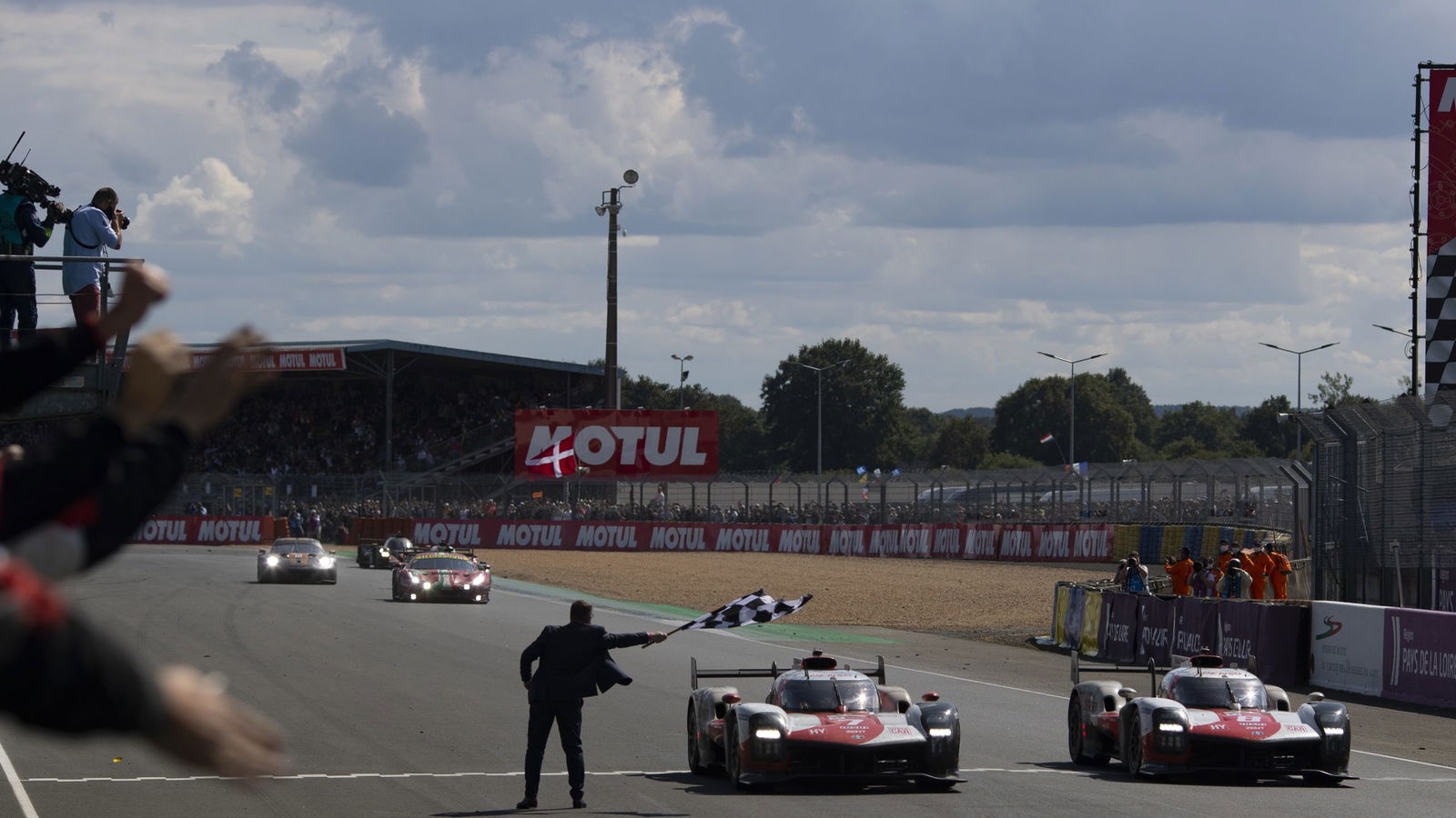 Le Mans' On-Track Flag-Waving Tradition Looked Sketchy As Hell This Year