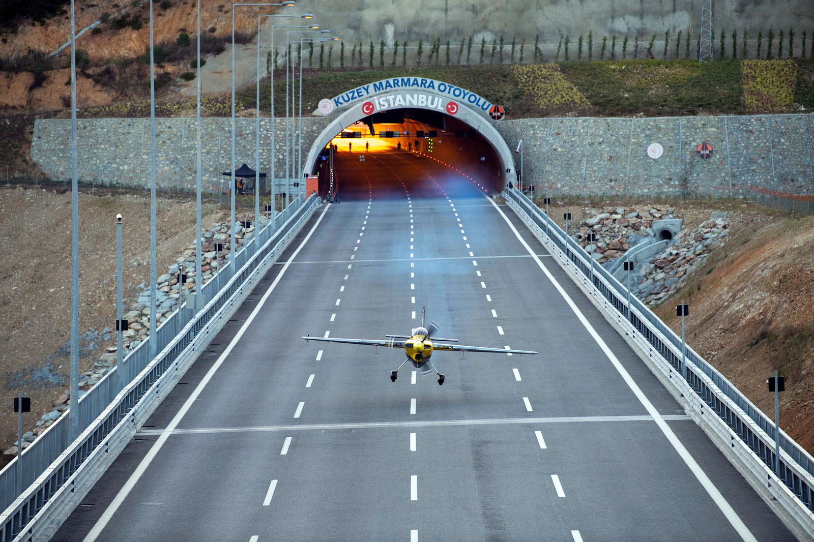 Watch A Plane Fly Through Two Tunnels In A Bonkers World-First Stunt