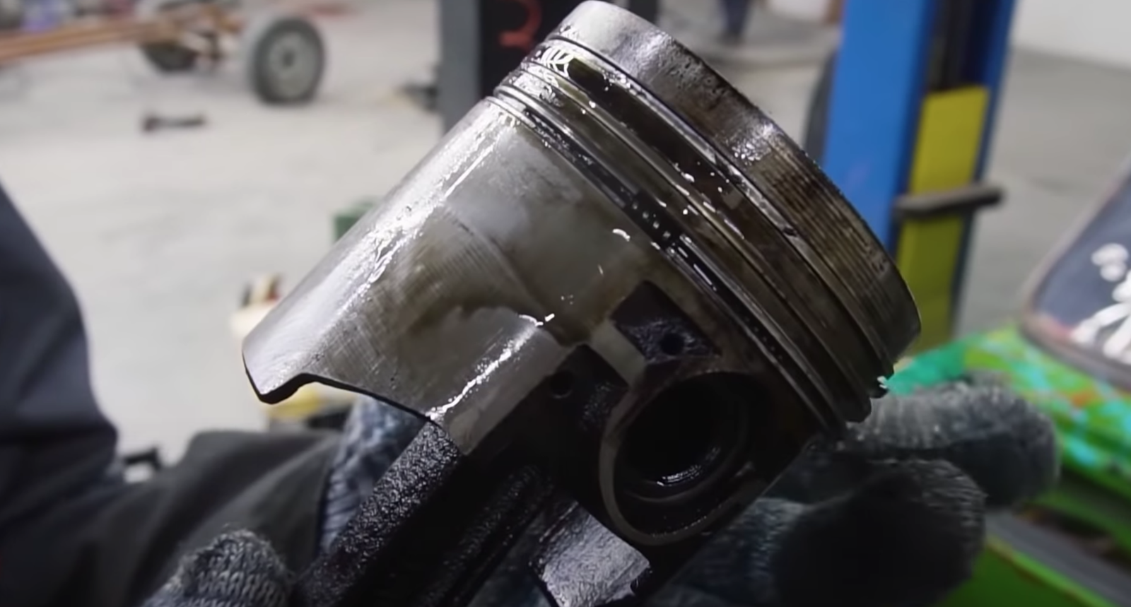 Your pistons should look like this, with three separate rings. The lower one is the oil wiper ring