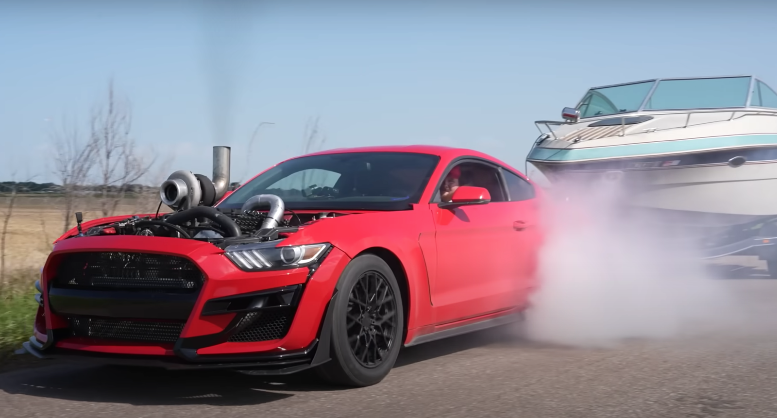 Just a diesel Mustang doing a burnout while towing a boat, no big deal...