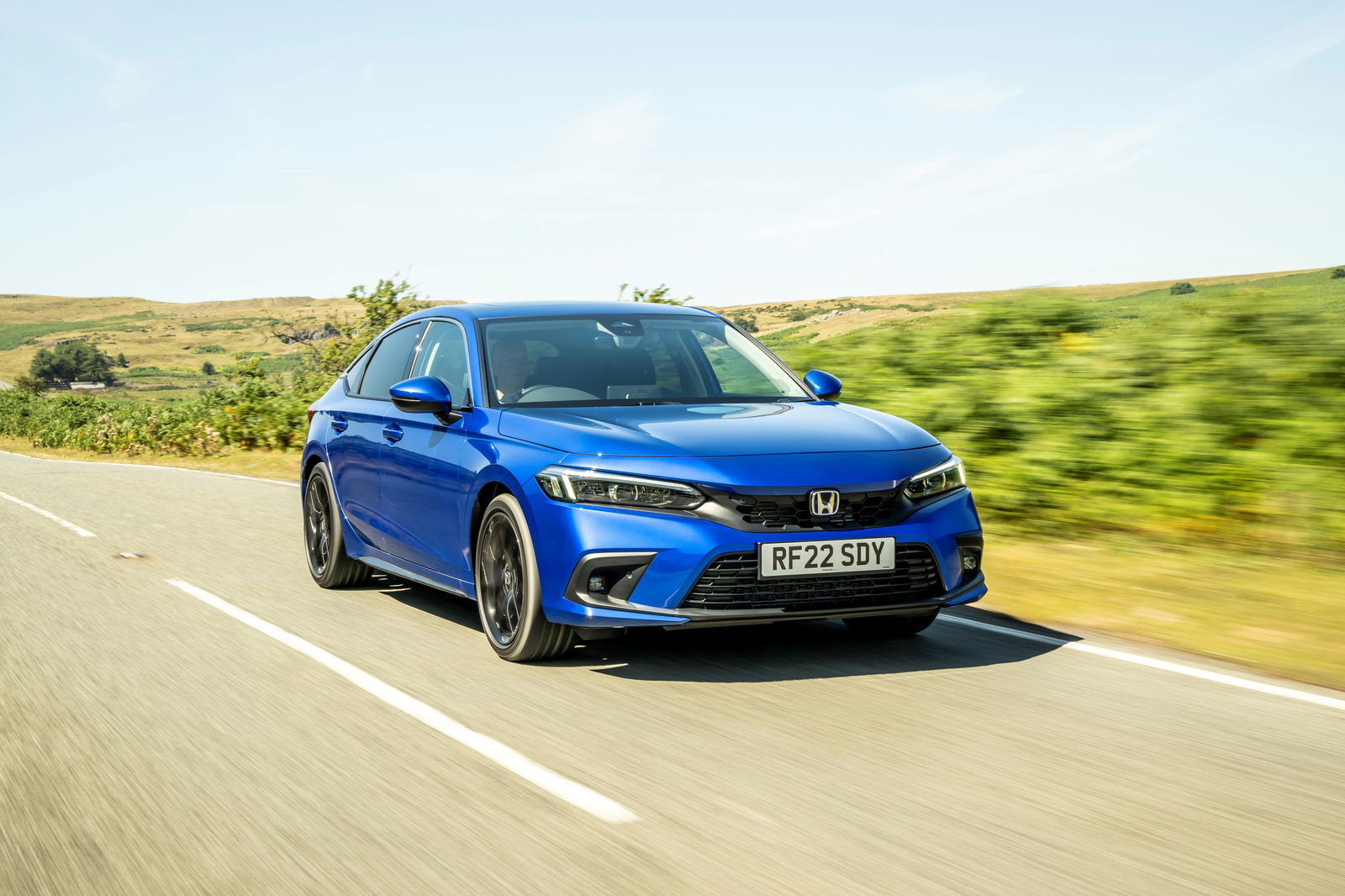 Tired of seeing the same cars on the school run? Meet the Peugeot 408 GT Hybrid 225